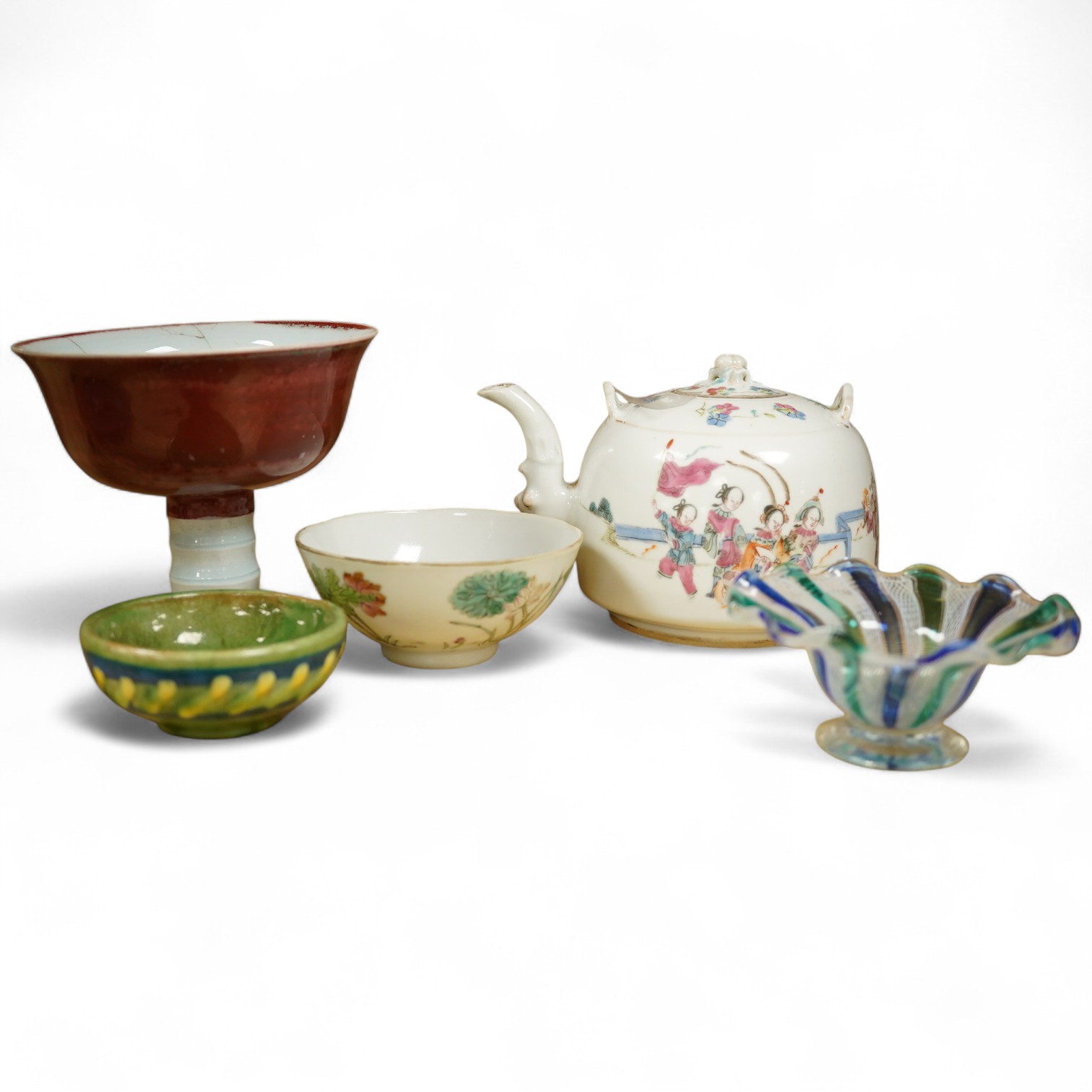An early 20th century Chinese famille rose teapot, later famille rose teabowl, sang de boeuf stem bowl and two others, tallest 11cm. Condition - varies